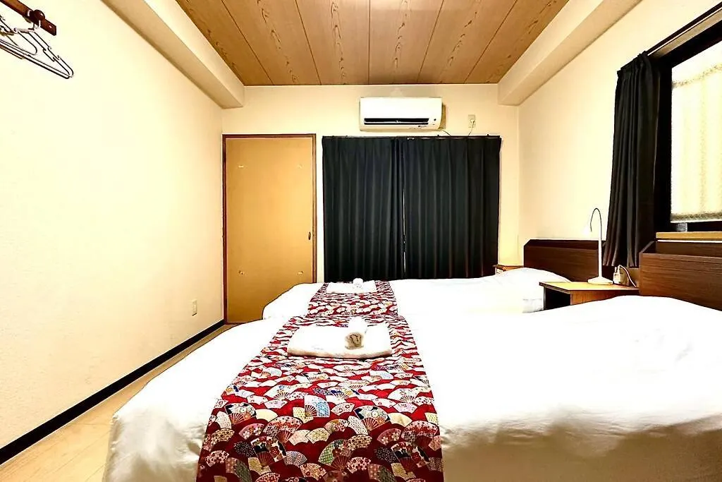 102号室花園町駅と萩之茶屋駅各2分ベット2台専用バスルーム付きアクセス抜群 Apartment Osaka