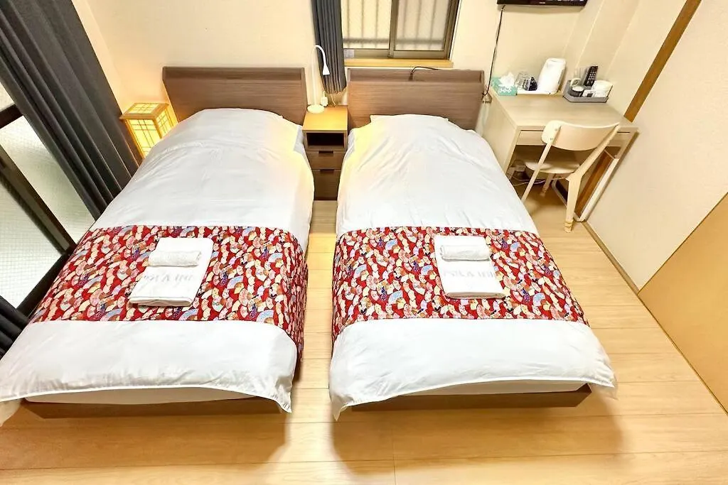 102号室花園町駅と萩之茶屋駅各2分ベット2台専用バスルーム付きアクセス抜群 Apartment Osaka